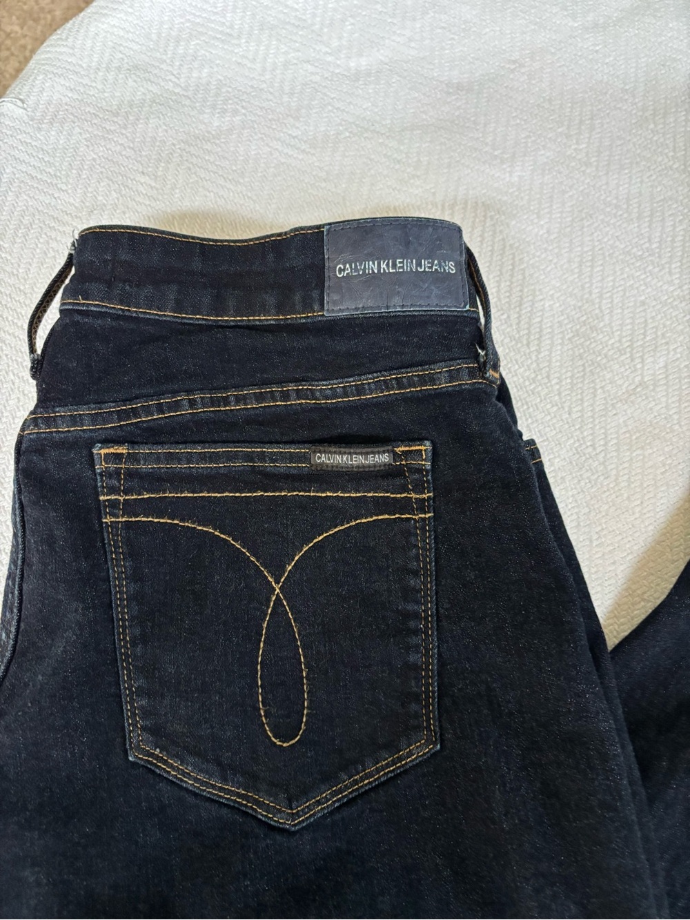 Calvin Klein Jeans Dark Indigo Denim with Gold Stitching